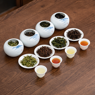 Longjing Jin Junmei Tieguanyin und Zhengshan Kleinspezies Tee Geschenk-Box für Kunden