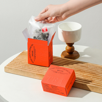 Alumni-Beziehungen Tee Geschenk Pfirsich Oolong Tee in Warmstempelverpackung 8. März Aktivität