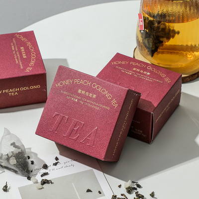 Alumni-Beziehungen Tee Geschenk Pfirsich Oolong Tee in Warmstempelverpackung 8. März Aktivität