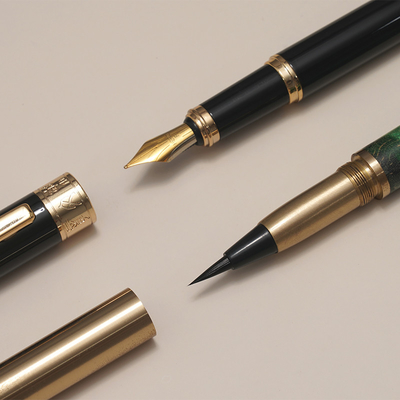 Einfarbiger Grafikdruck Momiao Präsidentenstift Heldenstift Wasserbürste 2-in-1 Geschenkbox
